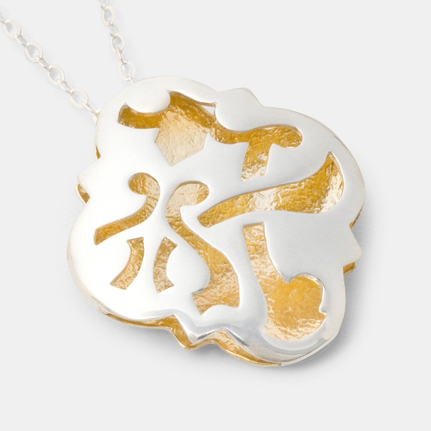 Quatrefoil Silver & Gold Pendant Necklace